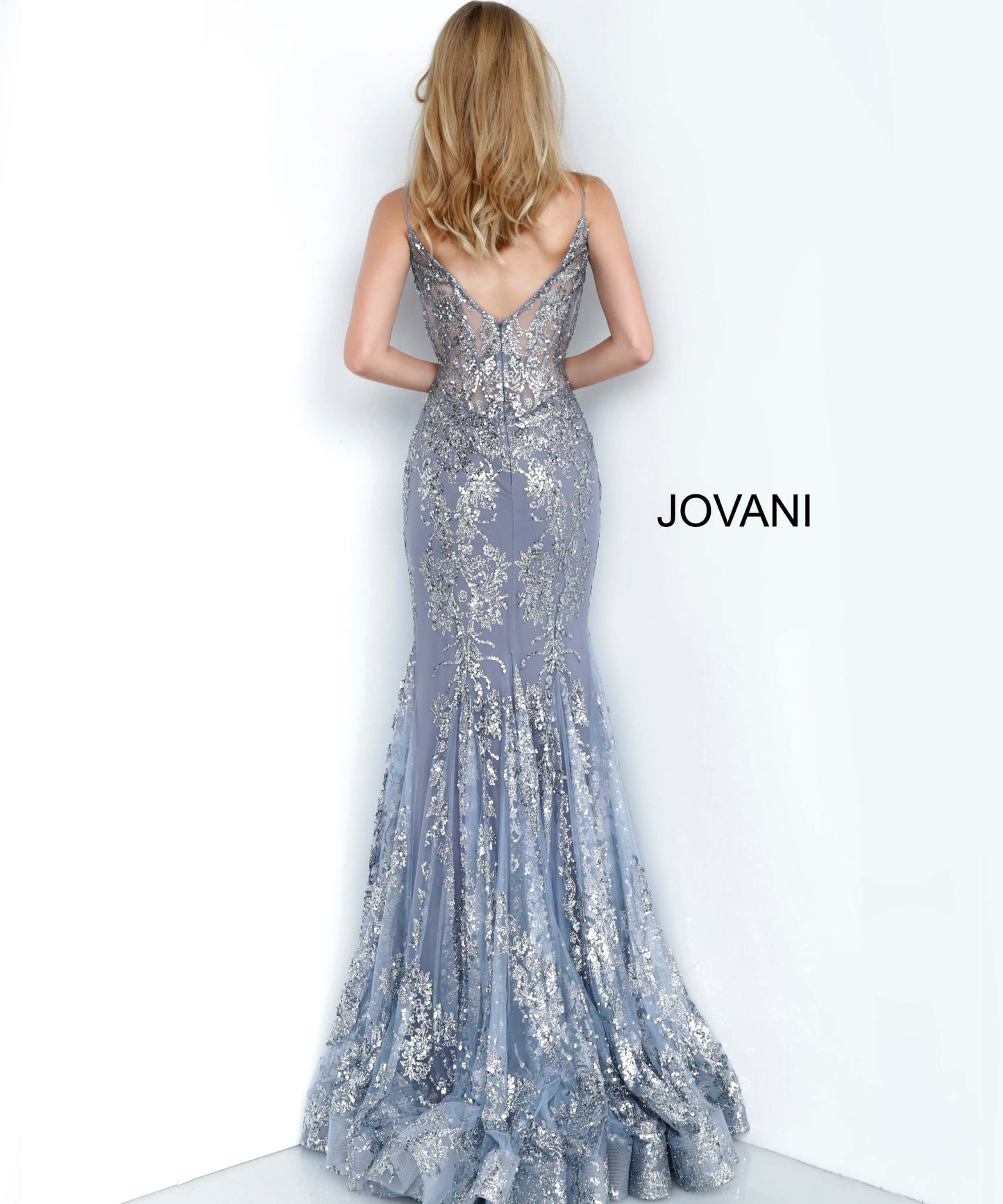 Jovani 3675 Prom Dress. Shine like a Diamond in Jovani 3675! This Gown Features an Embellished Sheer Corset Style Bodice with a Deep V Neckline. Mermaid Silhouette with a Glitter & Crystal Overlay on Tulle. 