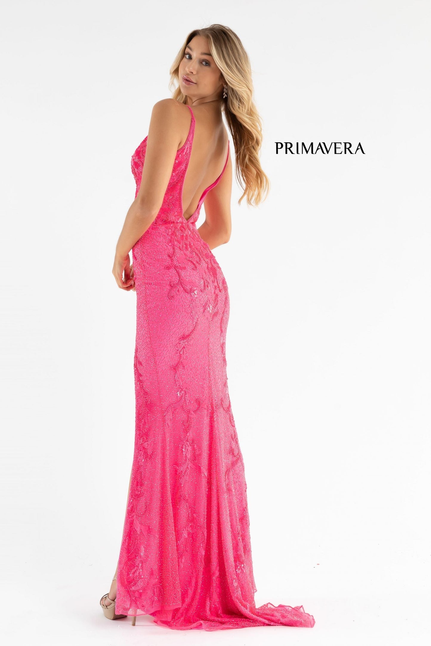 Primavera Couture 3727 This is a beautiful long beaded prom dress.  The V neckline is surrounded by gorgeous floral details that extend down the sides of the dress.  The back is a v open back and the skirt has a slit and sweeping train.  A magnificent choice for prom or formal evening dress.  Available colors:  Midnight, Black, Ivory, Mint, Red, Rose, Neon Pink,   Available sizes:  000-24