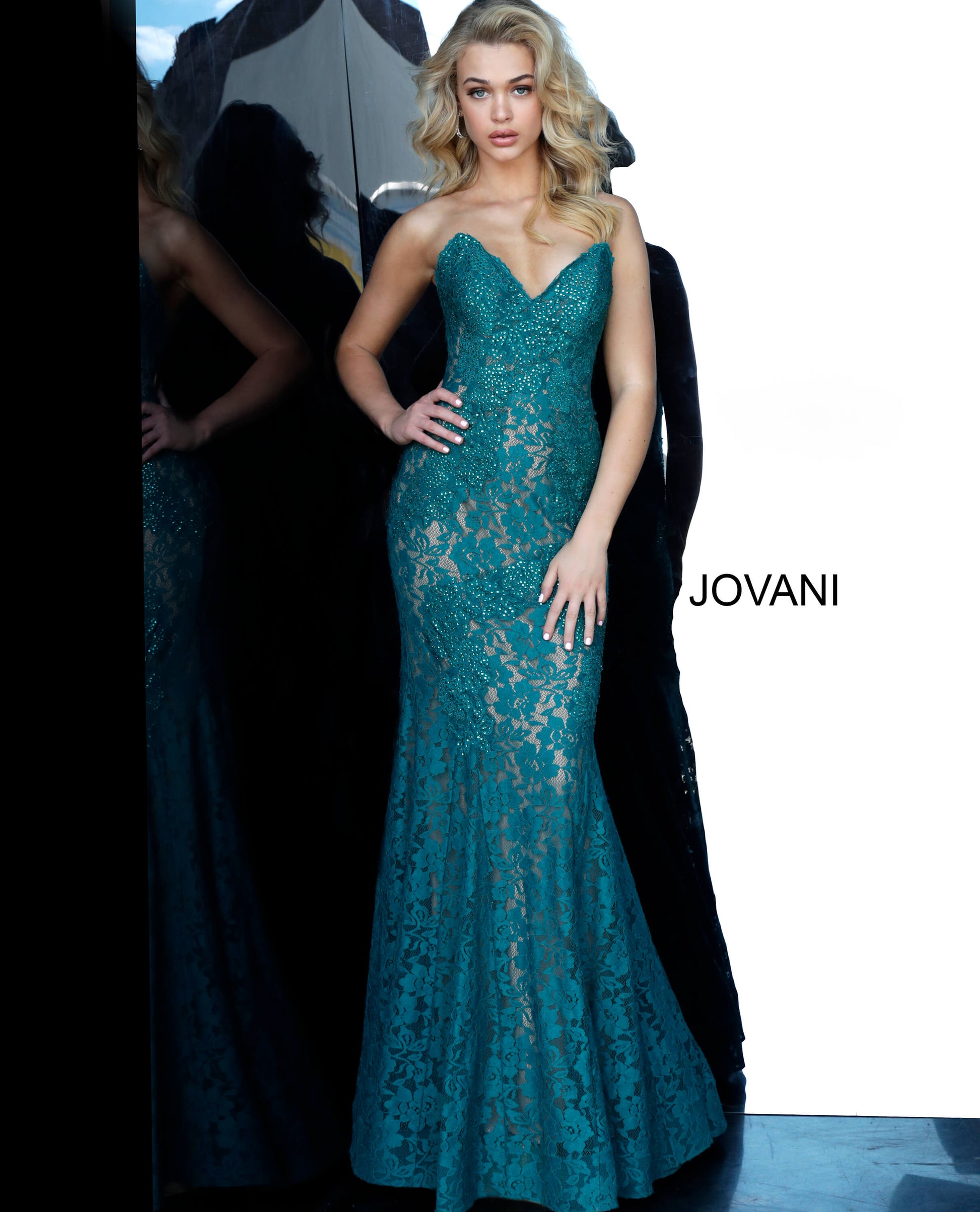 Jovani 37334 This beautiful, fitted, strapless lace dress features a sweetheart neckline. The top half of the trumpet dress is accessorized with rhinestones. Stretch nude lining with stretch lace overlay, heat set stones, form fitting, strapless. Available Sizes: 00,0,2,4,6,8,10,12,14,16,18,20,22,24  Available Colors: BLACK, BRIGHT PINK, DUSTY PINK, EMERALD, FUCHSIA, IVORY, LIGHT-BLUE, LILAC, MAUVE, NAVY, PERRIWINKLE, RED, ROYAL