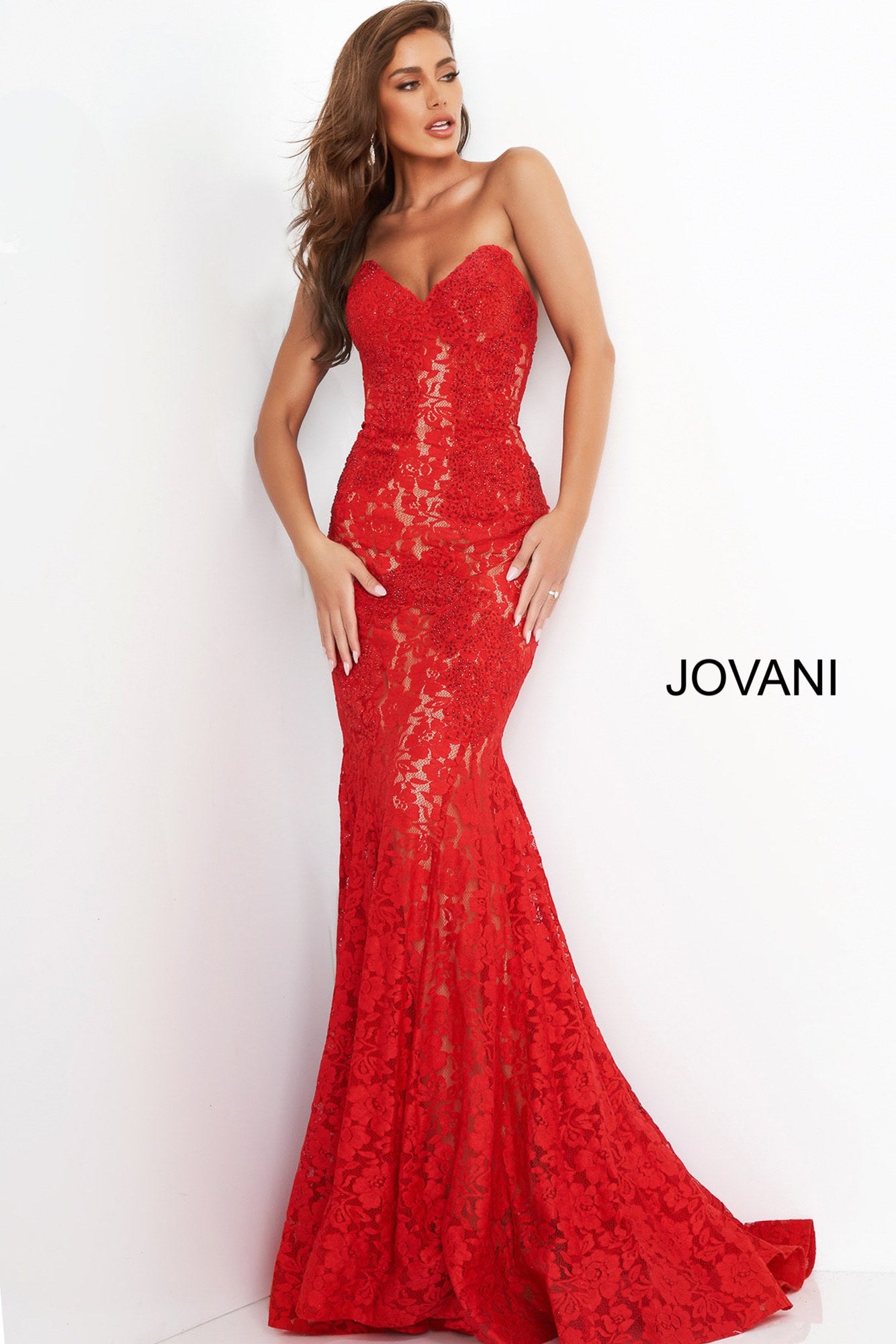 Jovani 37334 This beautiful, fitted, strapless lace dress features a sweetheart neckline. The top half of the trumpet dress is accessorized with rhinestones. Stretch nude lining with stretch lace overlay, heat set stones, form fitting, strapless. Available Sizes: 00,0,2,4,6,8,10,12,14,16,18,20,22,24  Available Colors: BLACK, BRIGHT PINK, DUSTY PINK, EMERALD, FUCHSIA, IVORY, LIGHT-BLUE, LILAC, MAUVE, NAVY, PERRIWINKLE, RED, ROYAL