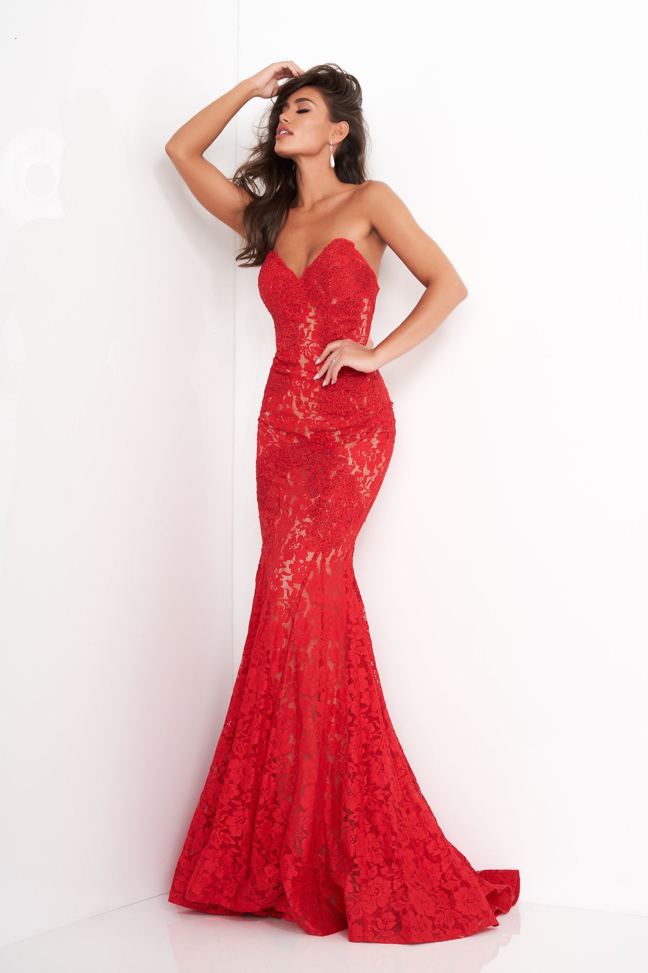 Jovani 37334 This beautiful, fitted, strapless lace dress features a sweetheart neckline. The top half of the trumpet dress is accessorized with rhinestones. Stretch nude lining with stretch lace overlay, heat set stones, form fitting, strapless. Available Sizes: 00,0,2,4,6,8,10,12,14,16,18,20,22,24  Available Colors: BLACK, BRIGHT PINK, DUSTY PINK, EMERALD, FUCHSIA, IVORY, LIGHT-BLUE, LILAC, MAUVE, NAVY, PERRIWINKLE, RED, ROYAL