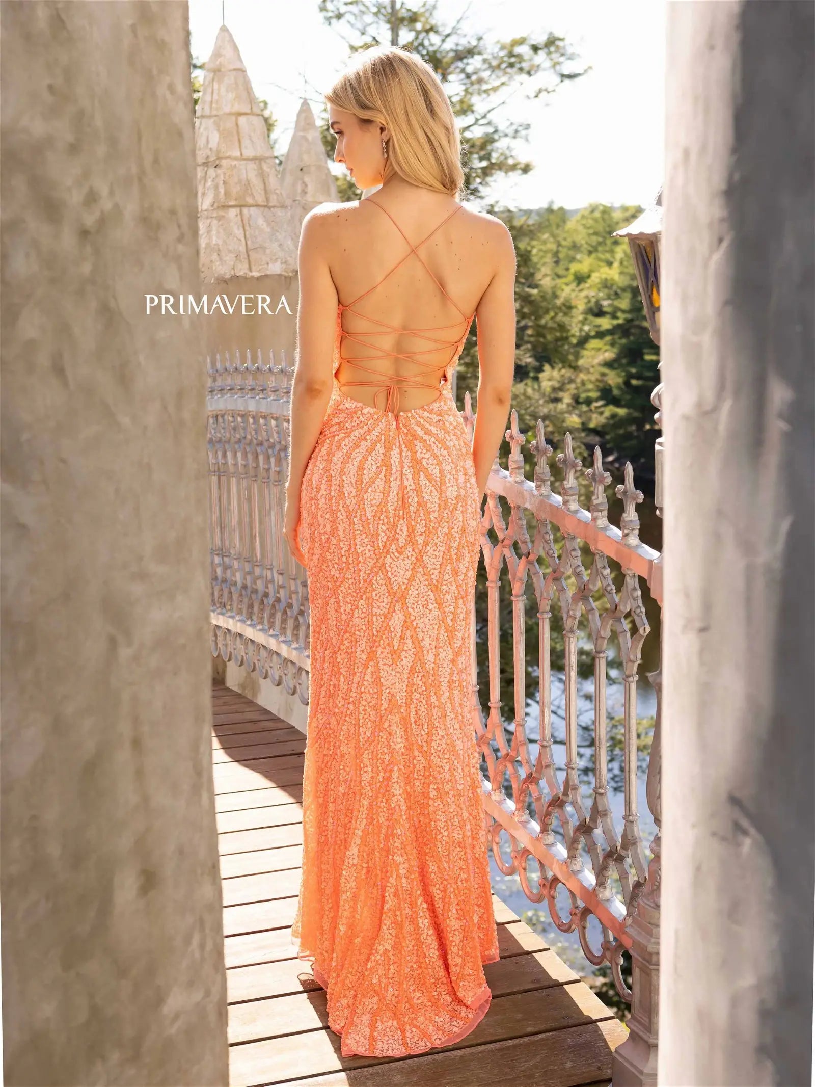 Primavera Couture 3959 Prom Dress Long Beaded Gown. This Gown has a beautiful design all over. Primavera Couture 3959 Sequin Scoop neck Prom Dress Backless Corset Slit Formal Gown  Size-000-18  Colors-Lilac, Coral