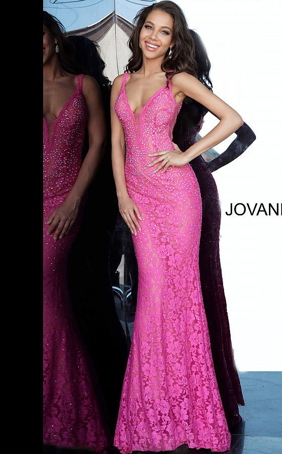 Jovani 48994 Stretch lace prom dress embellished with heat set stones, nude underlay, fitted silhouette, straps over shoulders, plunging v neckline with sheer mesh, sheer mesh inserts along the sides, sweeping train, low v back. Makes an excellent pageant gown or evening gown. 