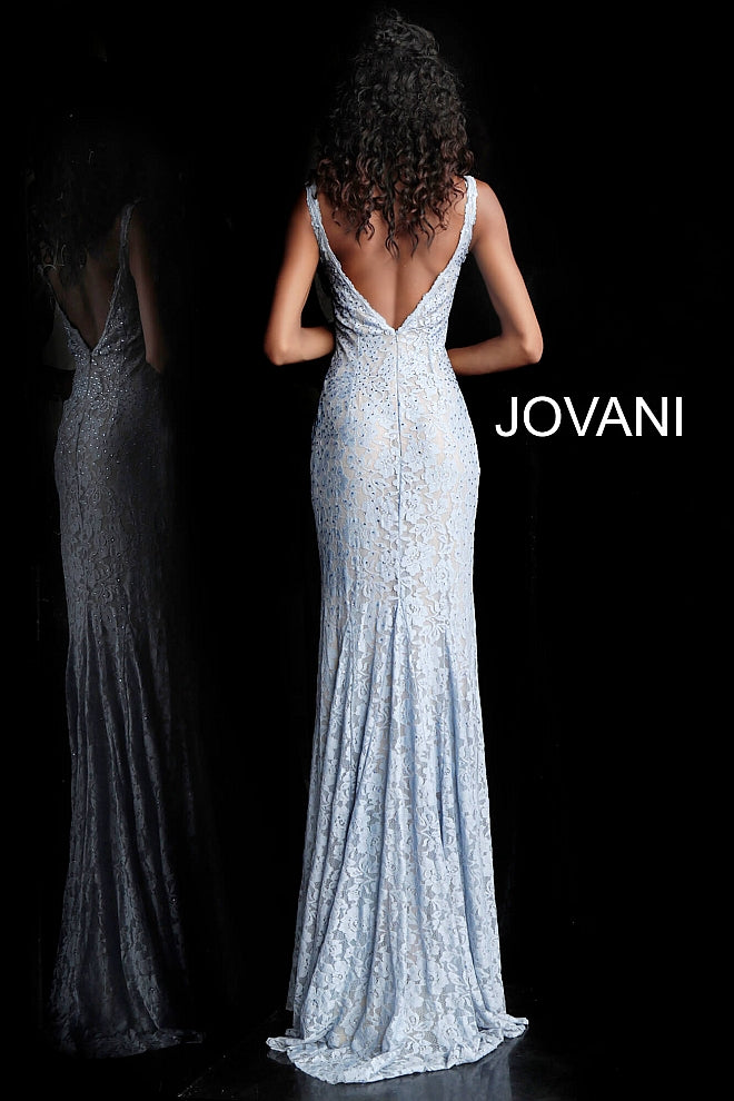 Jovani 48994 Stretch lace prom dress embellished with heat set stones, nude underlay, fitted silhouette, straps over shoulders, plunging v neckline with sheer mesh, sheer mesh inserts along the sides, sweeping train, low v back. Makes an excellent pageant gown or evening gown. 