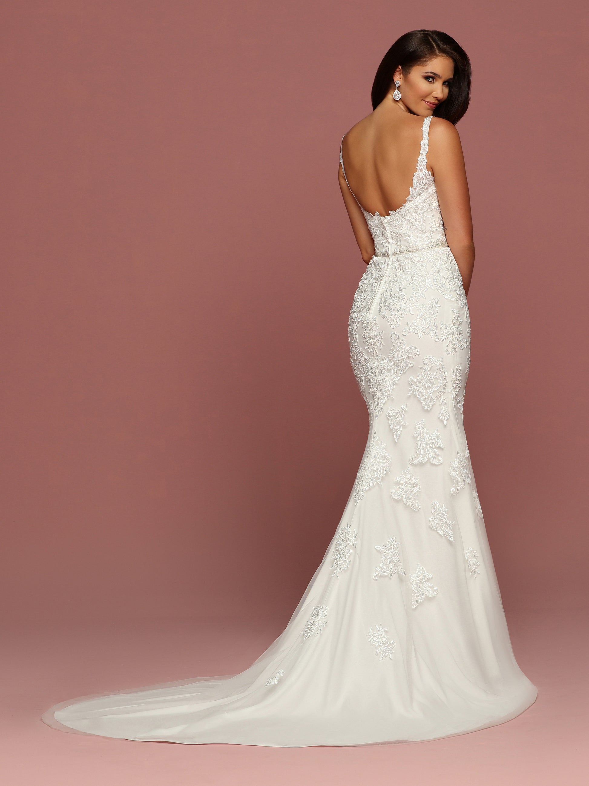 Davinci Bridal 50493 is a ling fitted mermaid silhouette wedding dress. Featuring a sheer lace illusion plunging neckline. Lace embellished straps. Crystal Embellished Bridal waist belt. Lace disperses the further down it cascades.  Available for 1-2 Week Delivery!!!  Available Sizes: 2,4,6,8,10,12,14,16,18,20  Available Colors: Ivory