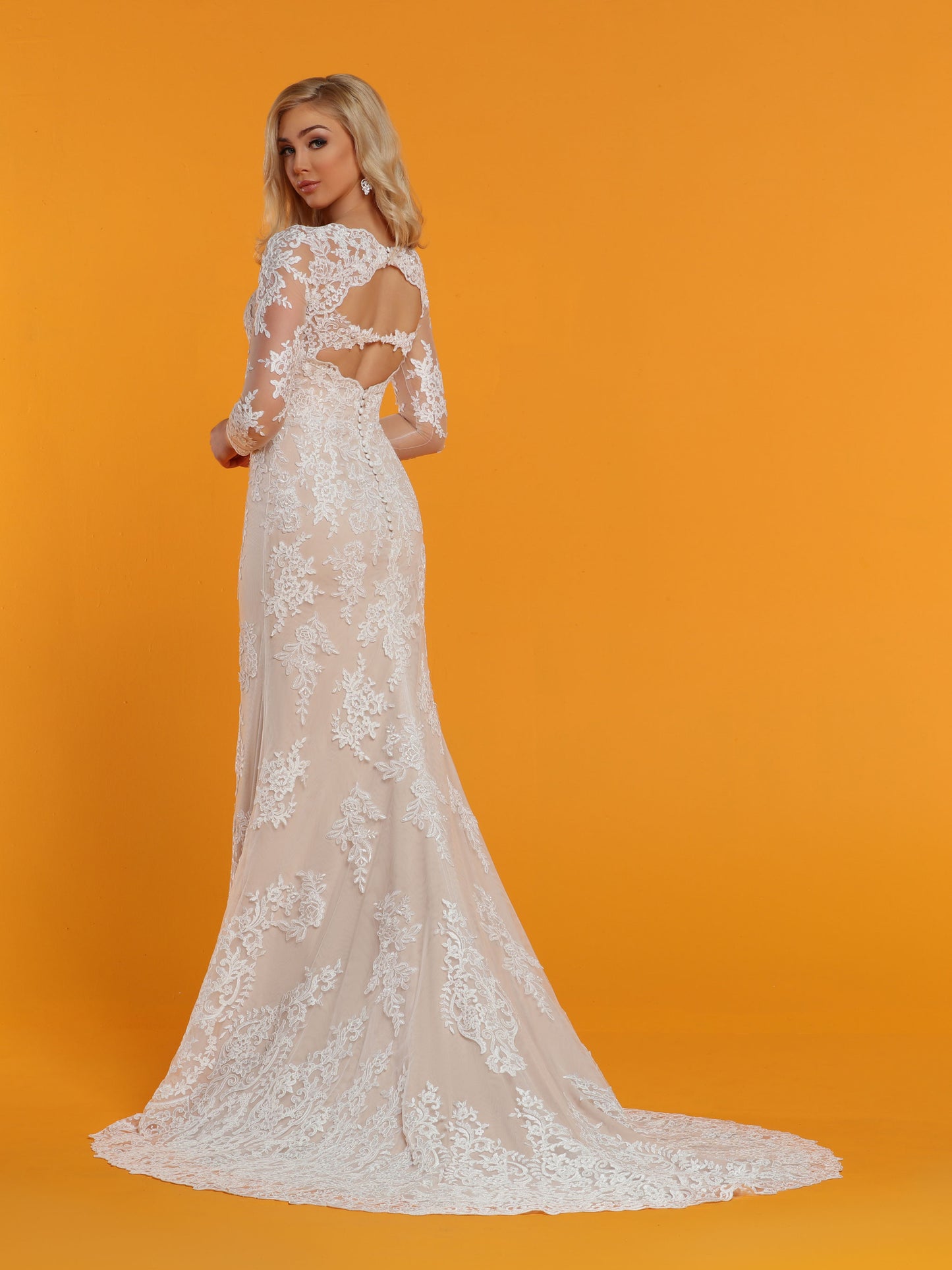 Davinci Bridal 50516 is a Fit & Flare Mermaid Wedding Dress. Featuring a sheer tulle & Lace Illusion Neckline back with scallop lace keyhole cut outs in the back with buttons lining the back seam. Sheer lace long sleeves.  Available for 1-2 Week Delivery!!!  Available Sizes: 2,4,6,8,10,12,14,16,18,20  Available Colors: Ivory/Nude, Ivory/Ivory