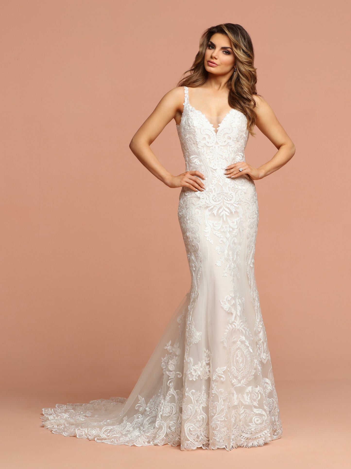 Davinci Bridal 50578 is a stunning Lace Mermaid Silhouette Fit & Flare Wedding Dress. Fitted Bodice with lace overlay on tulle. Plunging V Neckline with lace straps leading to a sheer illusion tulle back with lace tattoo effect. Elaborate lace edge on the lush skirt. Button Back seam.  Available for 1-2 Week Delivery!!!  Available Sizes: 2,4,6,8,10,12,14,16,18,20  Available Colors: Ivory/Blush, Ivory/Ivory