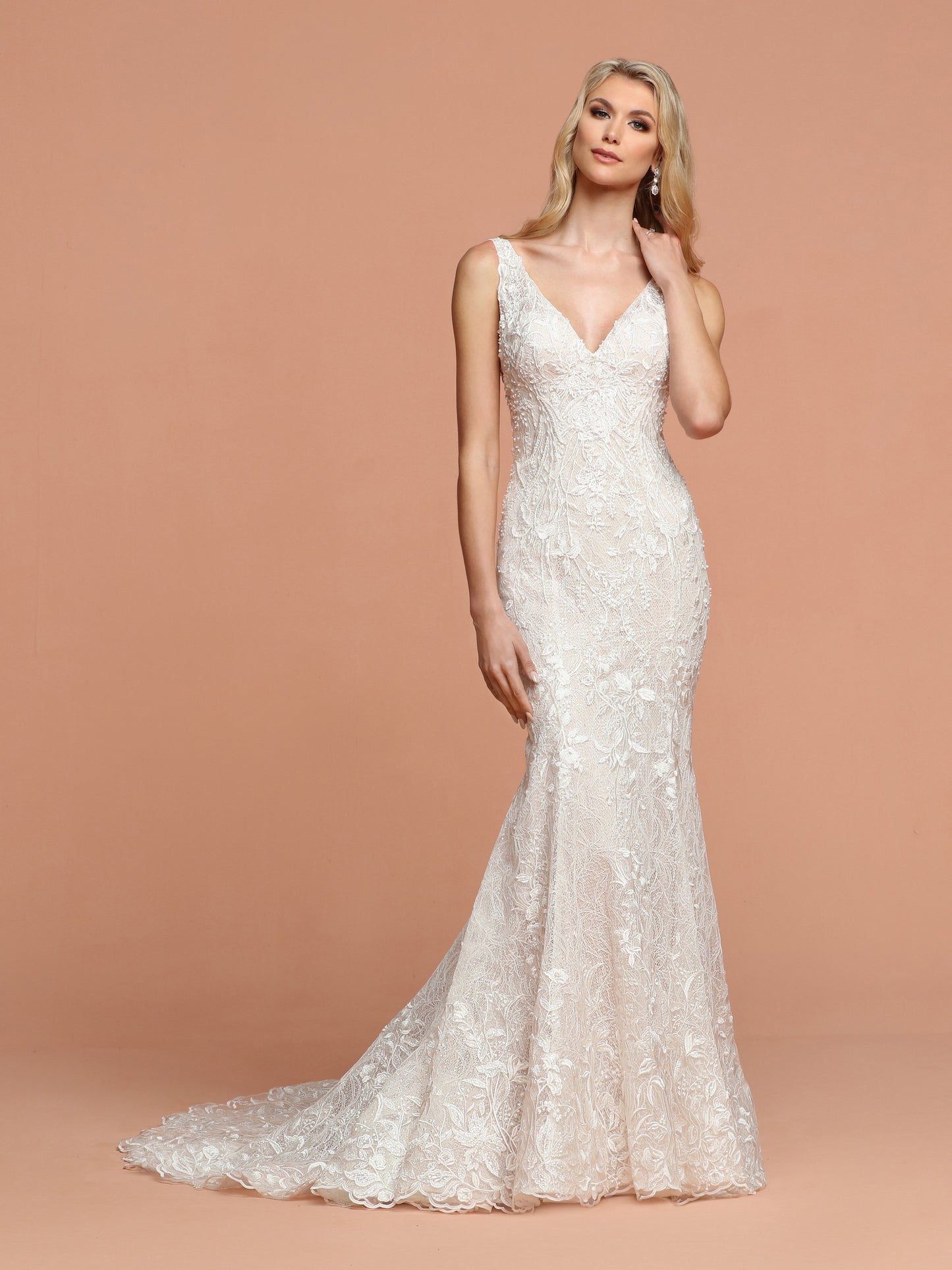 Davinci Bridal 50582 is a long Fitted All over Lace Embellished Wedding Dress. Featuring a V neckline with an open V back. Stunning gown is Hand beaded with a full lace train.  Available for 1-2 Week Delivery!!!  Available Sizes: 2,4,6,8,10,12,14,16,18,20  Available Colors: Ivory/Blush, Ivory/Ivory  Available Colors: Ivory/Blush, Ivory/Ivory