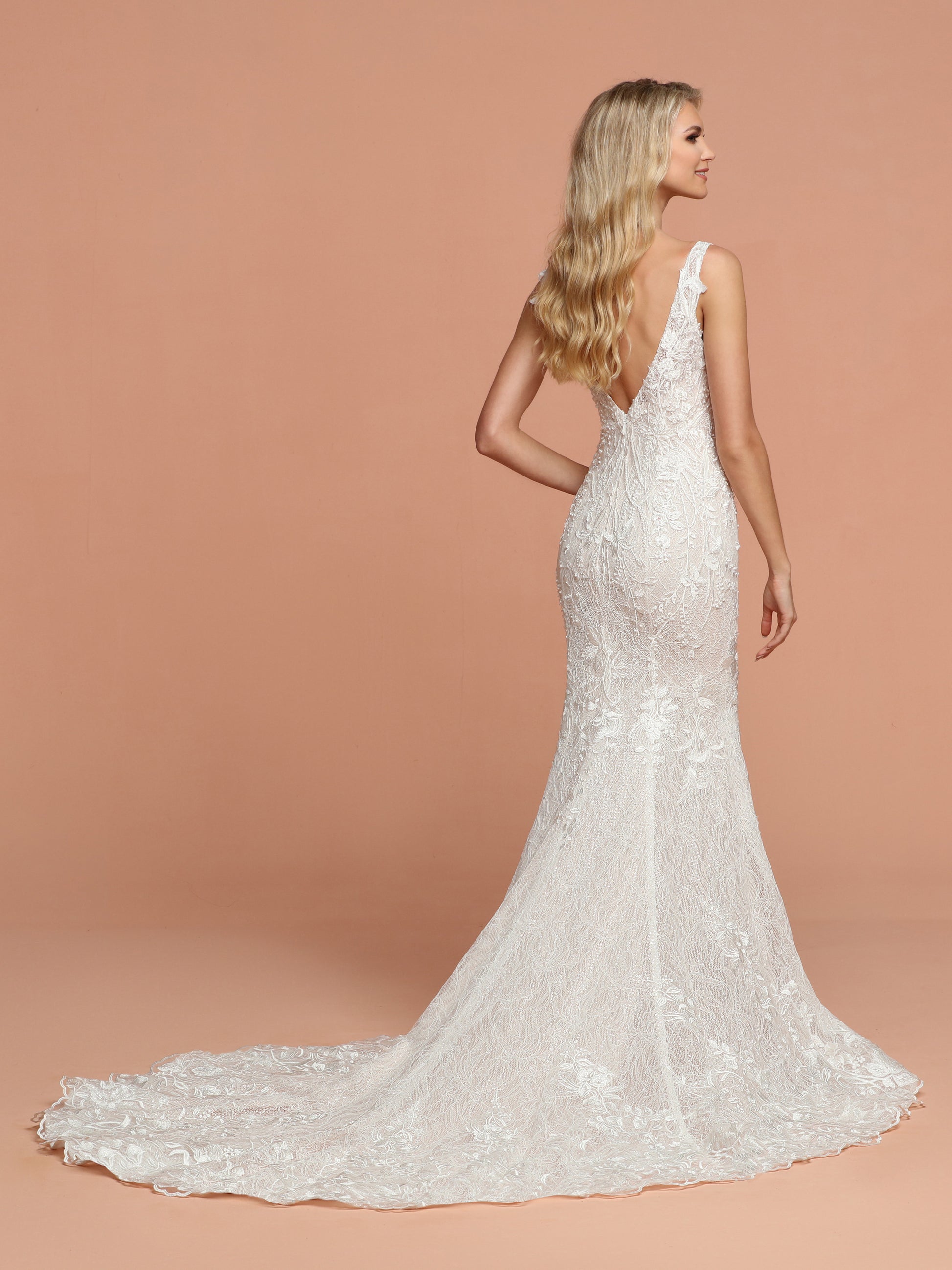 Davinci Bridal 50582 is a long Fitted All over Lace Embellished Wedding Dress. Featuring a V neckline with an open V back. Stunning gown is Hand beaded with a full lace train.  Available for 1-2 Week Delivery!!!  Available Sizes: 2,4,6,8,10,12,14,16,18,20  Available Colors: Ivory/Blush, Ivory/Ivory  Available Colors: Ivory/Blush, Ivory/Ivory