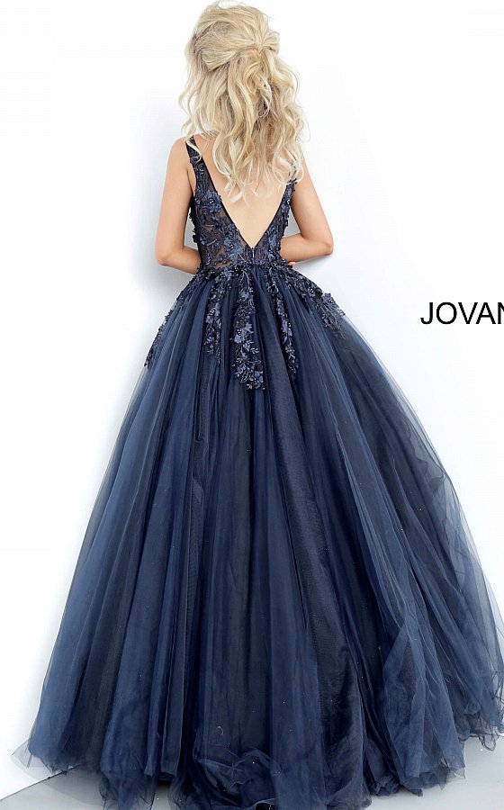 Jovani 55634 v neckline lace floral applique and tulle prom dress ball gown. Tulle ballgown, floor length, floral appliques, sheer sleeveless bodice, bra cups, v neckline and back. Available Colors: black/black, fuchsia, champagne, navy/black, off white/blush, off white/light blue, off white/off white, off white/yellow, off white/ lilac, red, teal  Available Sizes: 00 - 24