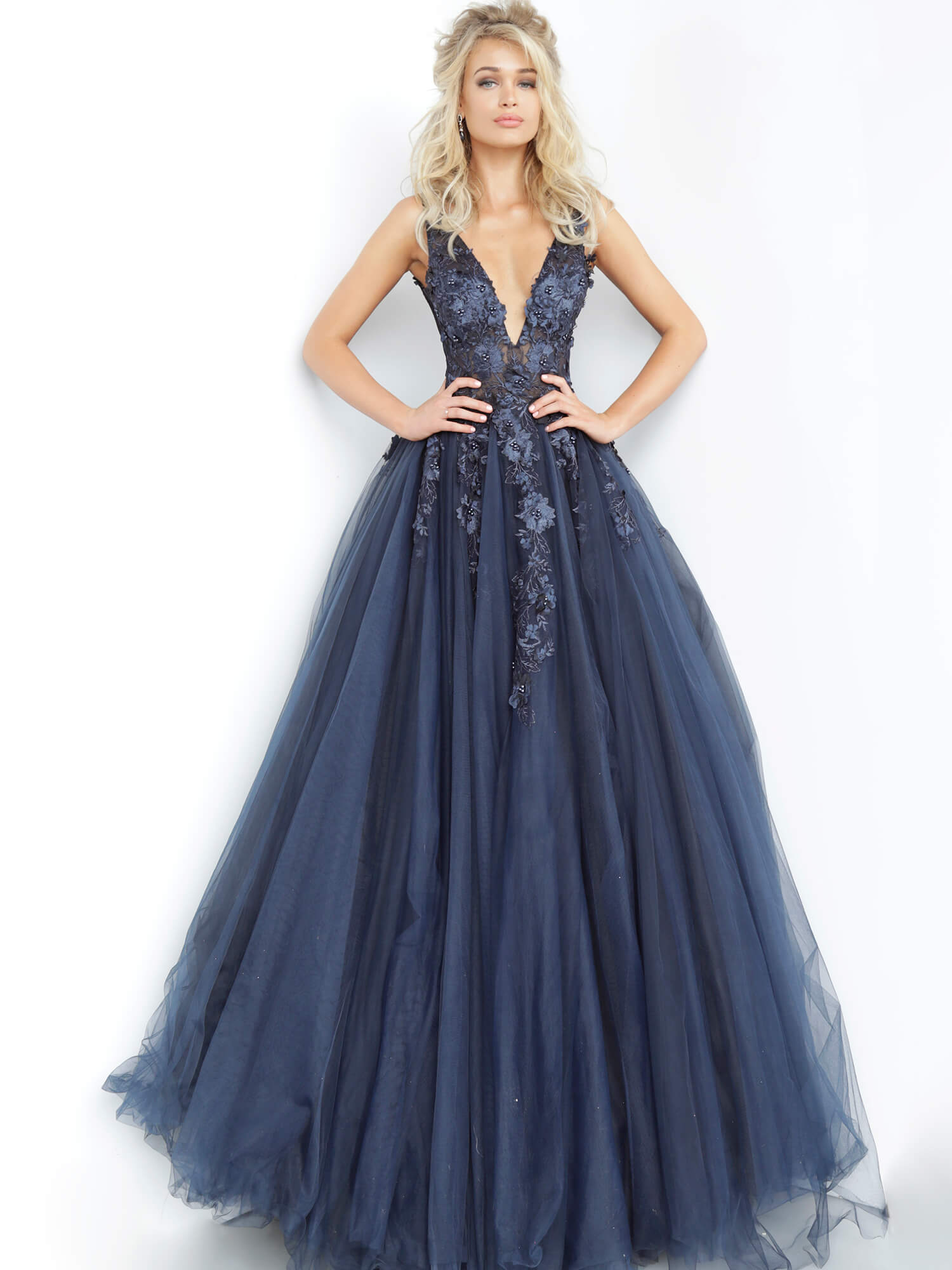 Jovani 55634 floral appliques v neckline prom dress ballgown Tulle ballgown, floor length, floral appliques, sheer sleeveless bodice, bra cups, v neckline and back.  Available Colors: black, champagne, navy/black, off white/blush, off white/light blue, off white/off white, off white/yellow, off white/ lilac, red, teal  Available Sizes: 00 - 24