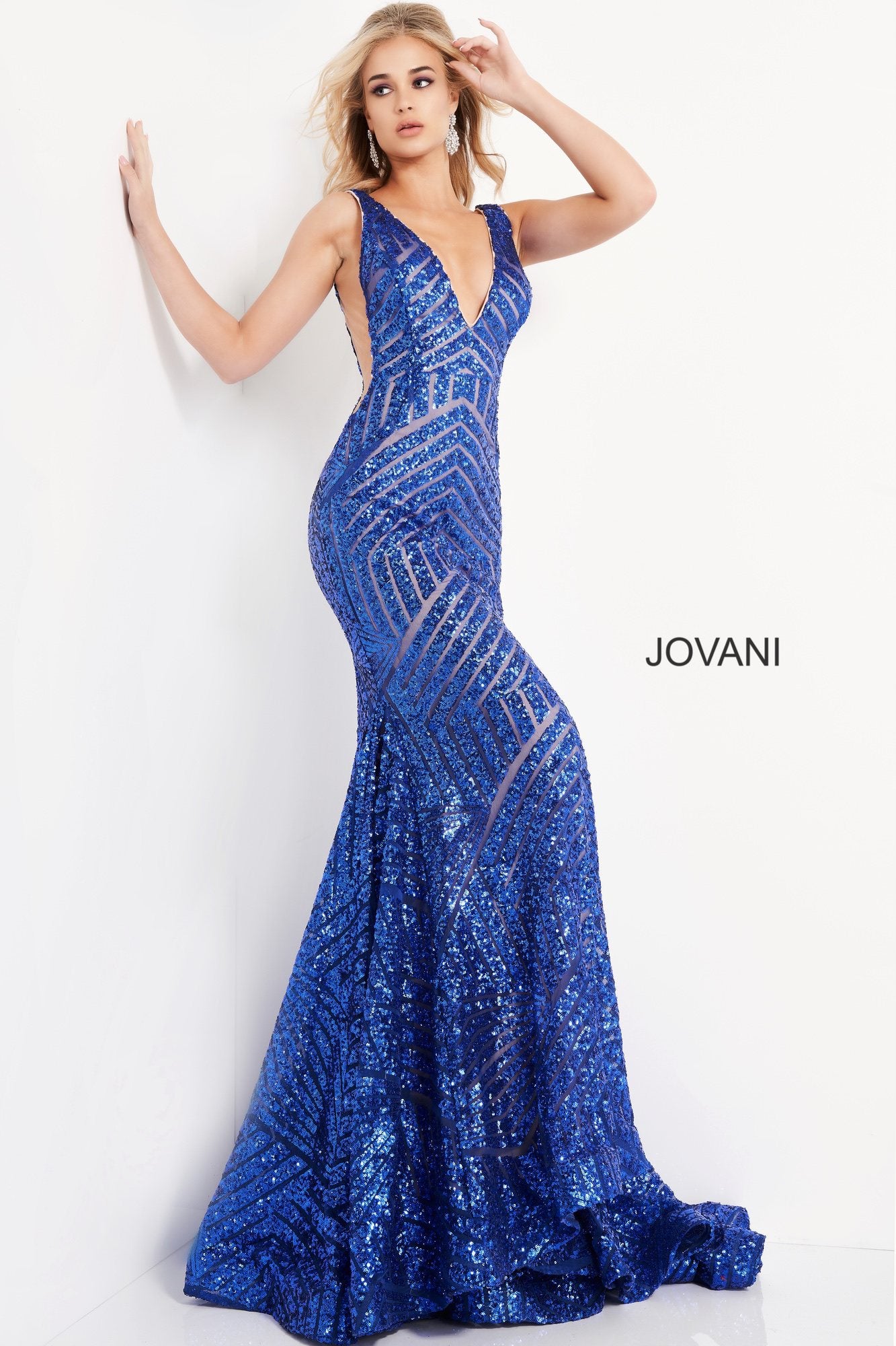 Long Jovani 59762 Prom Dress, Featuring a plunging neckline & A Fully sequined Fitted Mermaid Bodice. This Open V Back Pageant Gown & prom dress is perfect for the stage is has a lush trumpet sequin embellished skirt and sweeping train. 