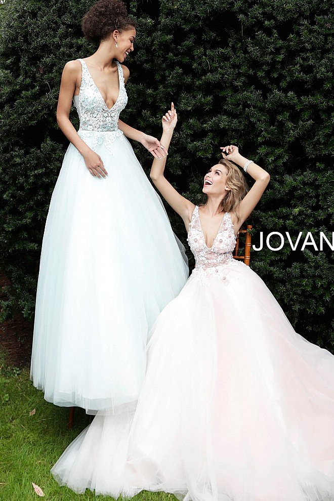 Jovani 61109 Blush floral applique tulle prom ball gown with a sheer sleeveless bodice, low v-neckline, V-shaped back and sheer sides, floor-length A-line flared and pleated skirt. A line V Neck Ballgown Prom Dress  Available Colors: Blush, Light Blue  Available Sizes 00-24