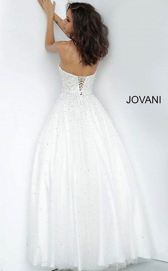 Jovani 65664 is a Prom Dress, Pageant Gown & simple wedding dress. Embellished tulle ballgown, fully lined, full floor length skirt, strapless bodice, straight neckline, lace up back. Available Sizes: 00-24  Available Colors: light-blue, light-pink, off-white