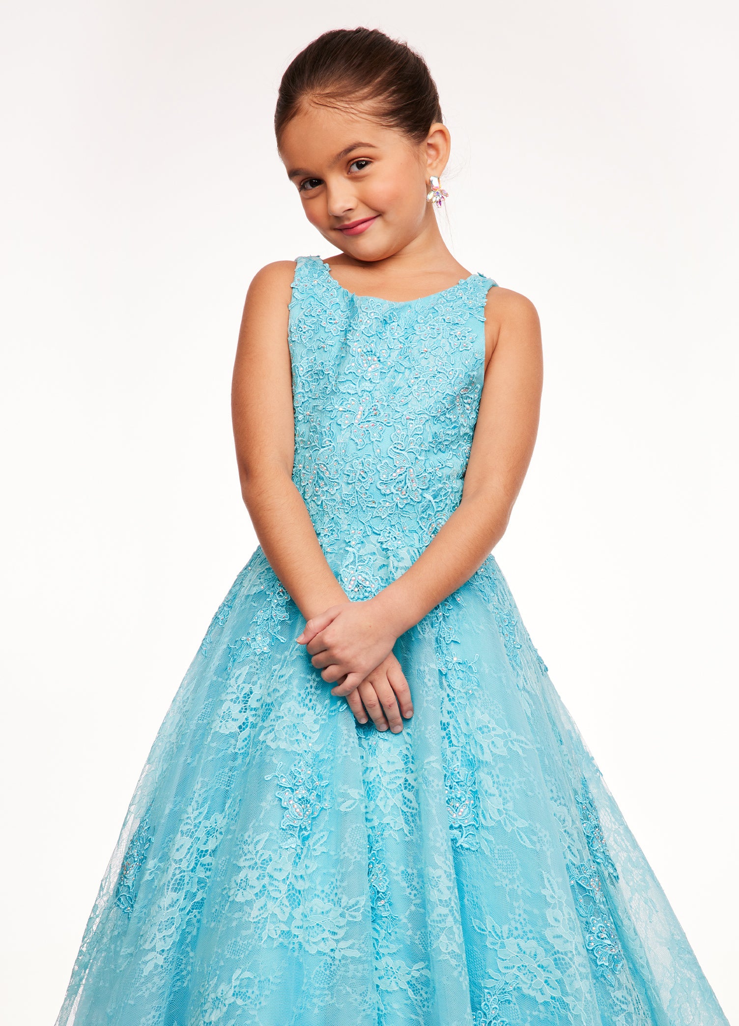 Ashley Lauren Kids 8073 Girls Long Lace A Line Ball Gown Pageant Dress High Neck Lovely lace gown featuring a crew neckline embellished with lace applique and AB stones throughout the bodice and skirt. Crew Neckline Lace Applique A-Line Available Sizes: 4-16 Available Colors: Aqua, Lilac