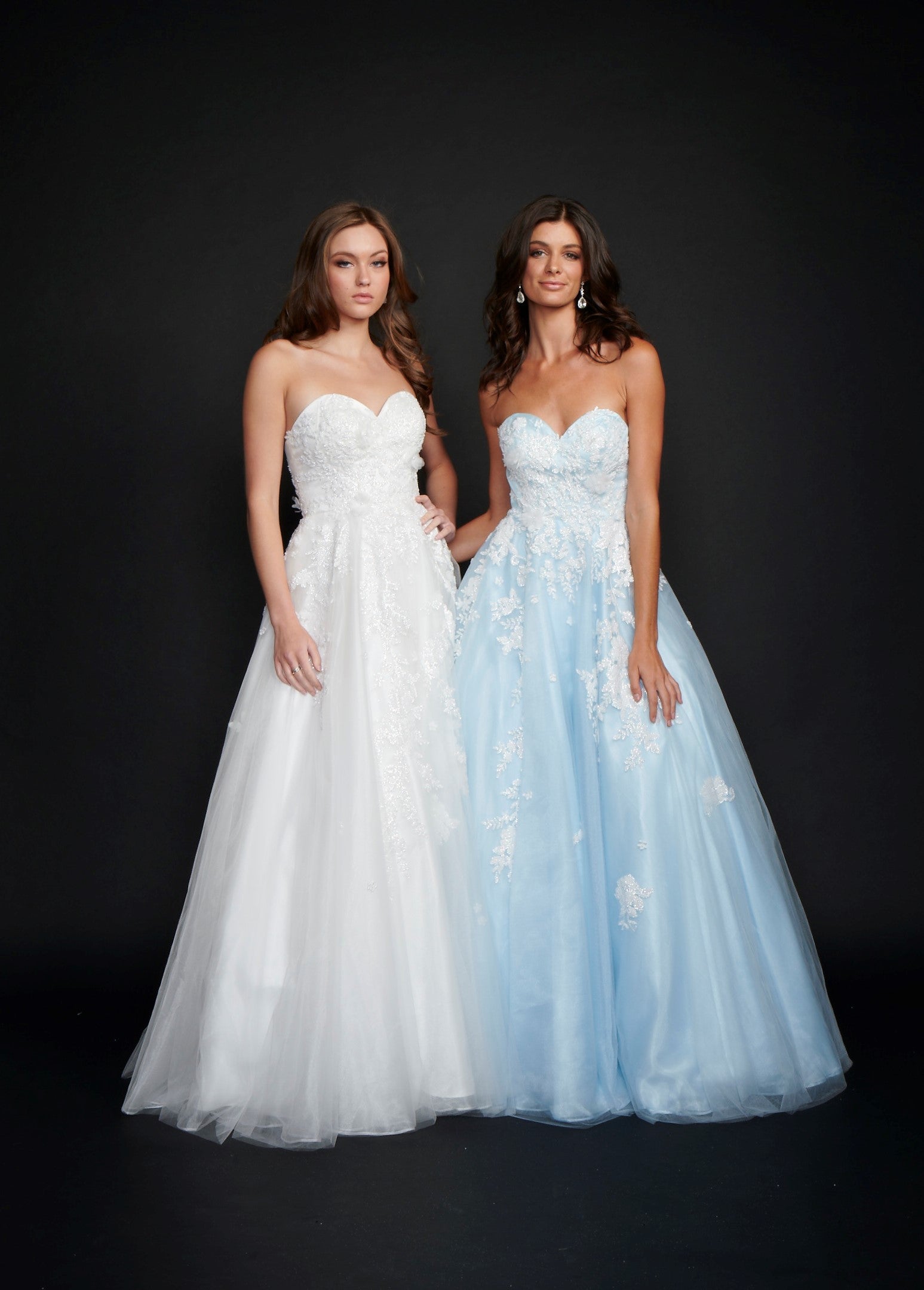 Nina Canacci 9137  This is a strapless ballgown with a sweetheart neckline and 3D floral appliques on the bodice and streaming down the dress. It is good for a Wedding dress or Prom Gown.   Available Size- 4-18  Available Color- Baby Blue, Ivory