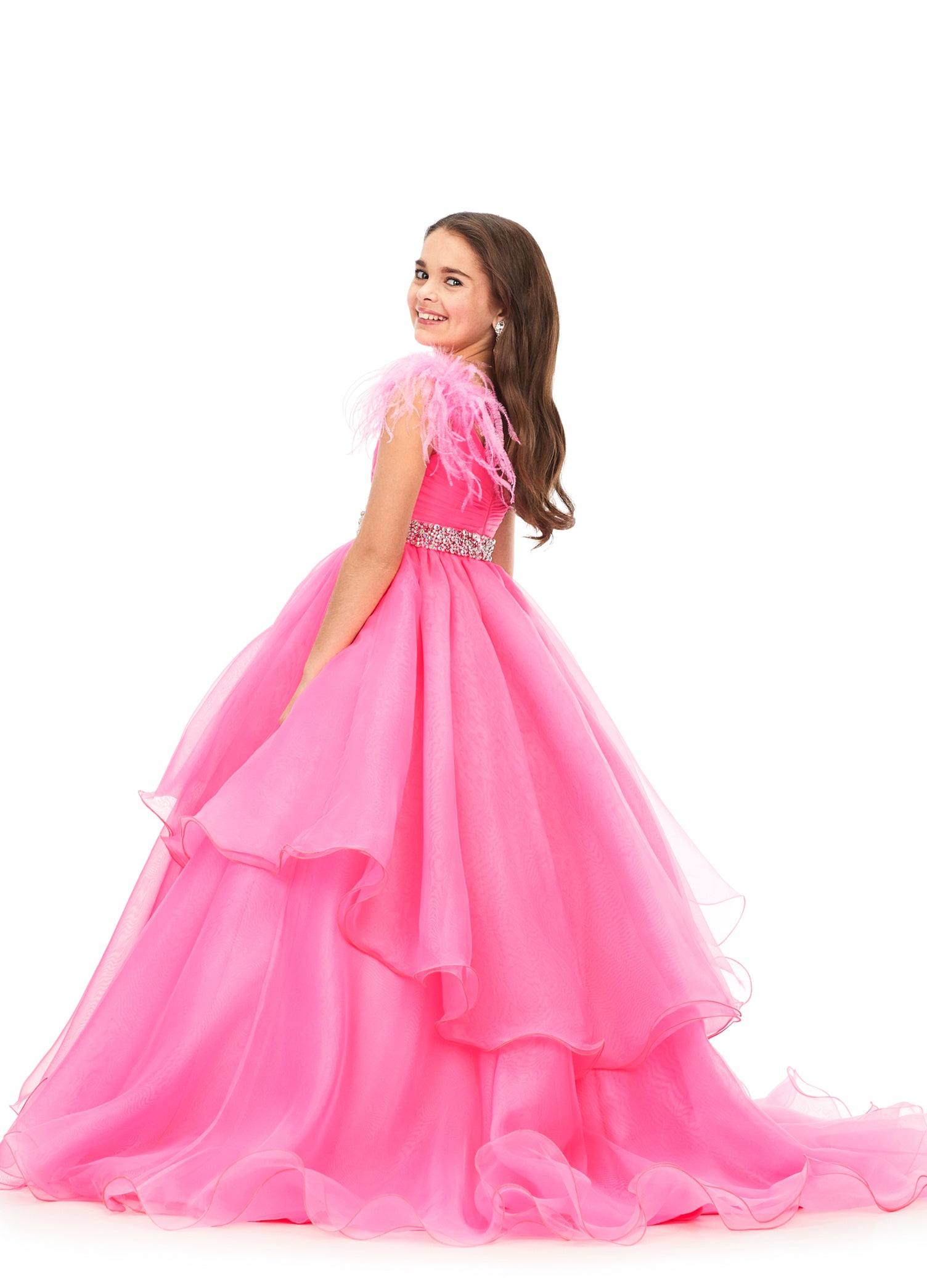 Ashley Lauren Kids 8184 Girls Pageant Dress Ball Gown with Feather Details  This organza kids ball gown features feather shoulders cascading to a crystal encrusted waistline. The layered skirt completes the look.