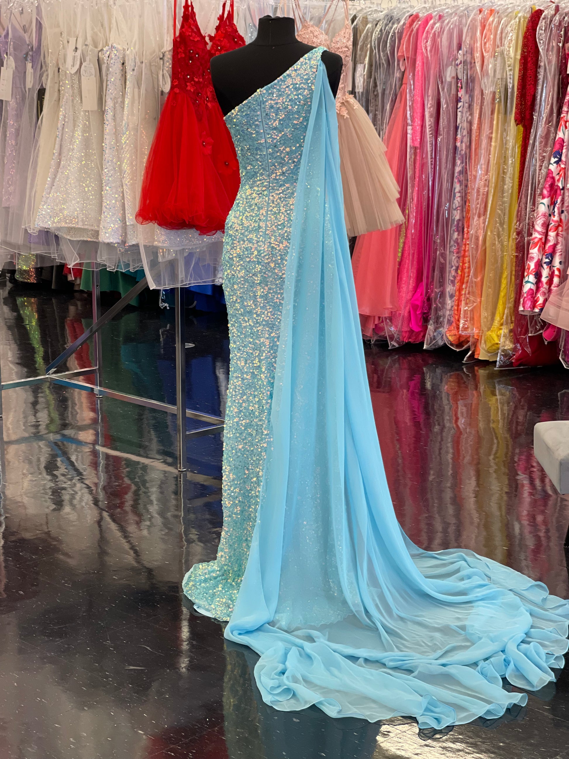 Ashley Lauren 11371 One Shoulder Prom Dress fully sequence with shoulder cape and slit.  Colors : Candy Pink, AB Turquoise, Coral, Emerald, Royal, Sky  Sizes: 0-24  One Shoulder Shoulder cape Slit Fully sequenced 