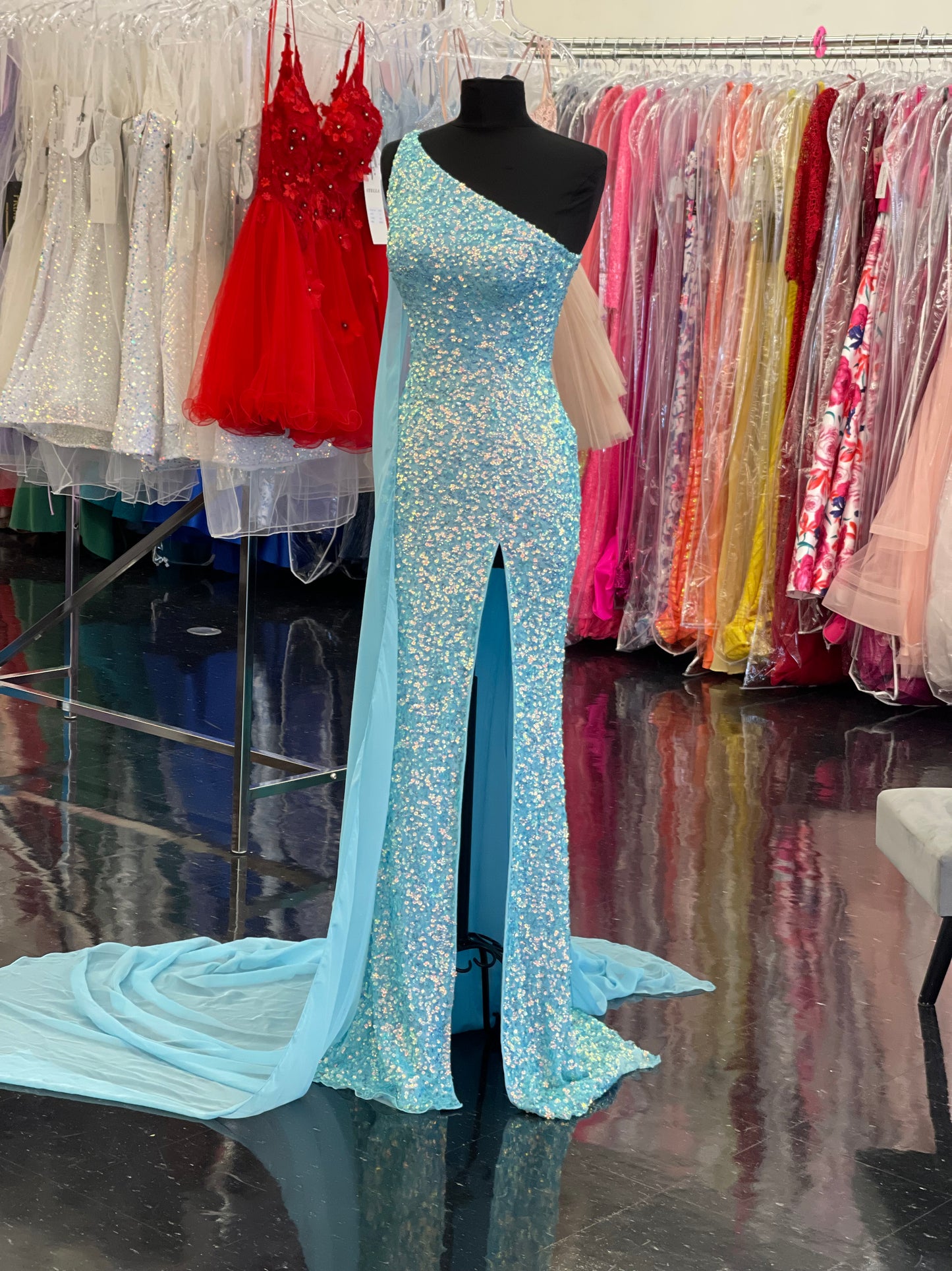 Ashley Lauren 11371 One Shoulder Prom Dress fully sequence with shoulder cape and slit.  Colors : Candy Pink, AB Turquoise, Coral, Emerald, Royal, Sky  Sizes: 0-24  One Shoulder Shoulder cape Slit Fully sequenced 