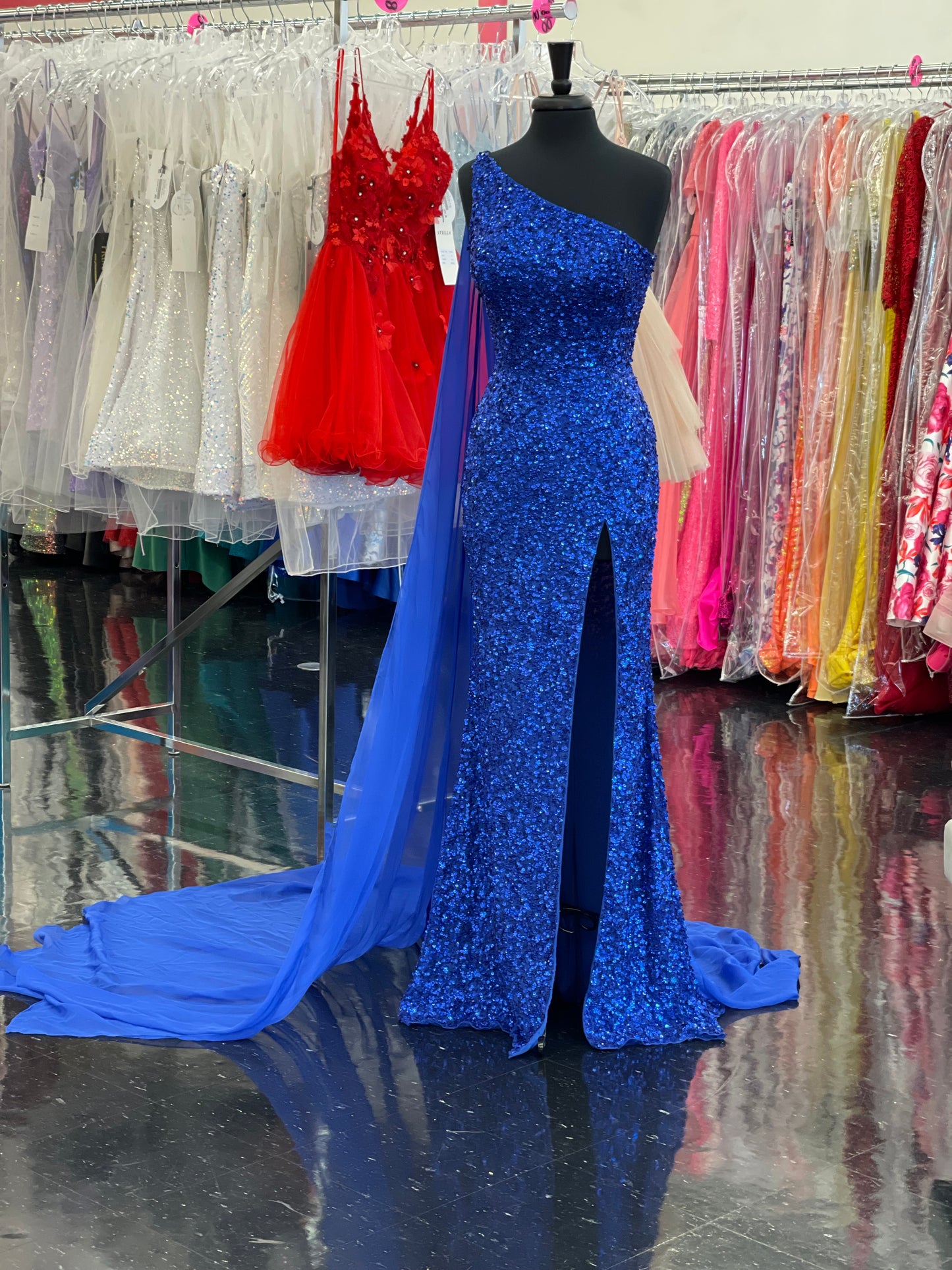 Ashley Lauren 11371 One Shoulder Prom Dress fully sequence with shoulder cape and slit.  Colors : Candy Pink, AB Turquoise, Coral, Emerald, Royal, Sky  Sizes: 0-24  One Shoulder Shoulder cape Slit Fully sequenced 