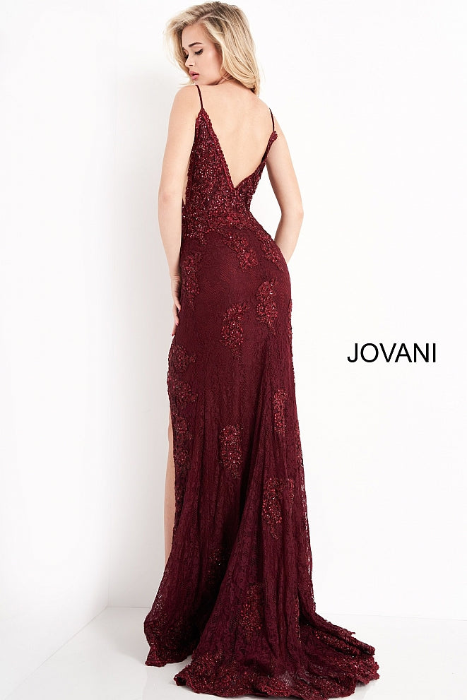 Jovani JVN00864 is an absolute stunner! Long Fitted Prom Dress or Unique Sexy Wedding Dress. Delicately Embellished Lace with a Plunging neckline & High Slit with scallop lace edges. Spaghetti straps with a slightly sheer lace bodice. JVN 00864