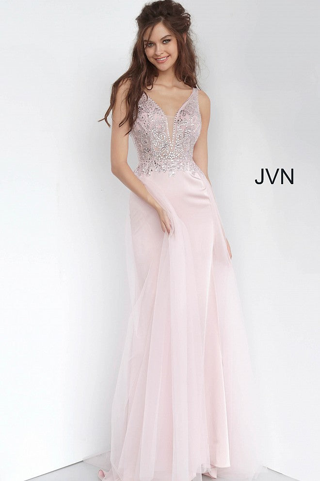 JVN 02253 is a long fitted Prom Dress with a sheer Embellished bodice with a Deep V Plunging Neckline with a mesh insert. Features an open V Back. Fitted Skirt has a tulle overlay overskirt with embellishments cascading from the bodice to add a soft transition. Great pageant gown or Dress for any formal event!