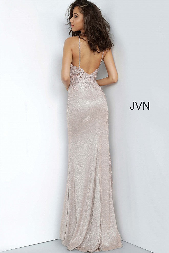 JVN 2205 Is a Beautiful Shimmery Prom Dress! Iridescent Shimmer Skirt is accented by a sheer Bodice with Lace & Crystal Embellishments. This Cascades down the side of the skirt. Absolutely breath taking in person!