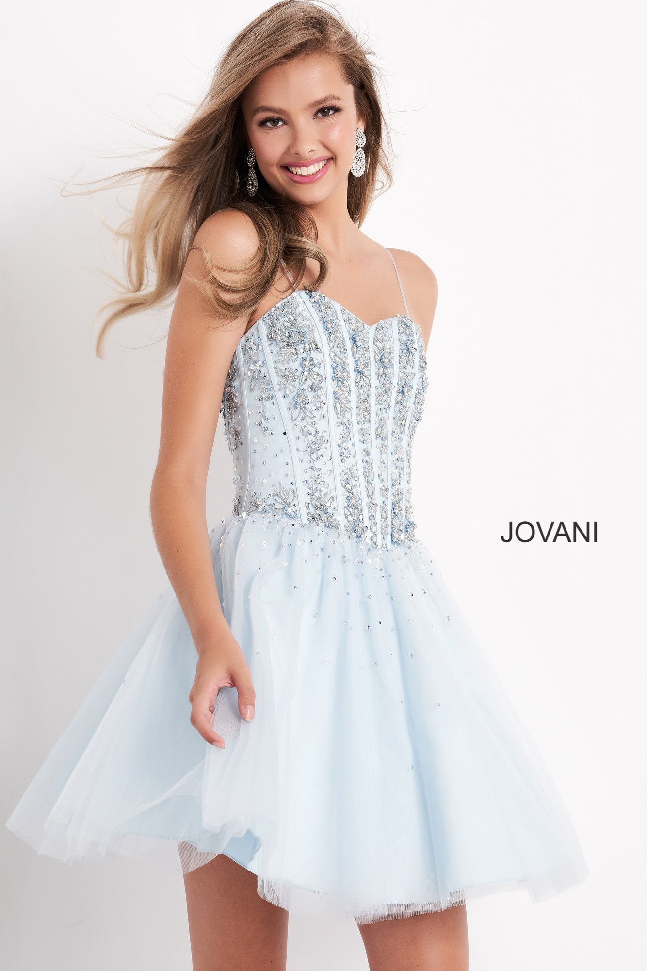 Jovani Kids k62533 is a Short Girls Prom Dress, Kids Pageant Gown & Pre Teen Formal Evening Wear gown. This Short Girls Fit & Flare Dress Features a sweetheart neckline with spaghetti straps. Embellished & Beaded Corset Bodice with boning. Embellishments cascade into the flared tulle skirt.  Available Girls Sizes: 8, 10, 12, 14  Available Colors: Black, Blue, Fuchsia, White