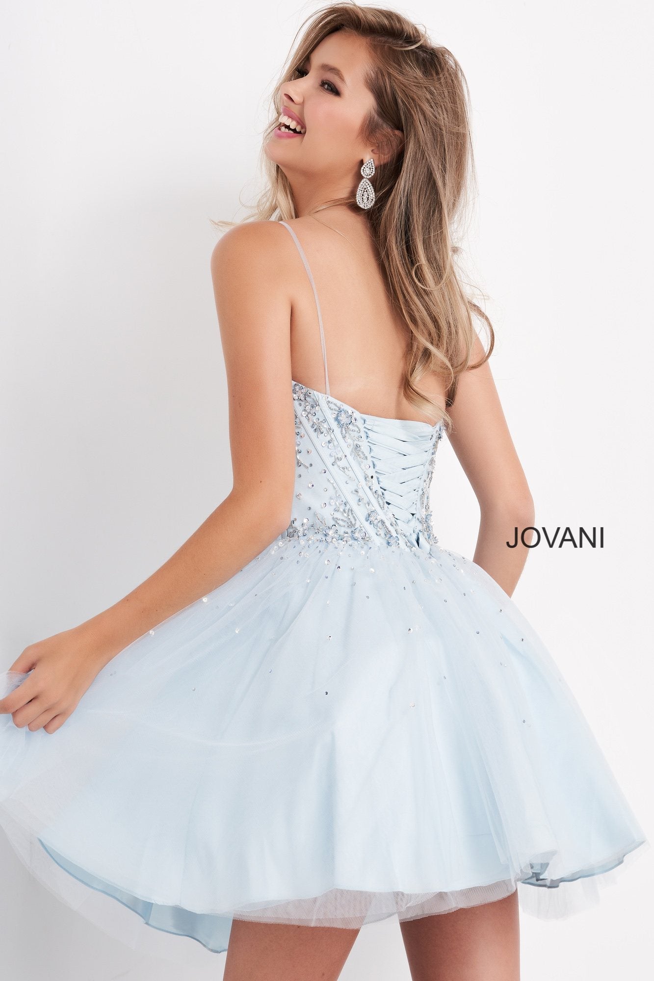 Jovani Kids k62533 is a Short Girls Prom Dress, Kids Pageant Gown & Pre Teen Formal Evening Wear gown. This Short Girls Fit & Flare Dress Features a sweetheart neckline with spaghetti straps. Embellished & Beaded Corset Bodice with boning. Embellishments cascade into the flared tulle skirt.  Available Girls Sizes: 8, 10, 12, 14  Available Colors: Black, Blue, Fuchsia, White