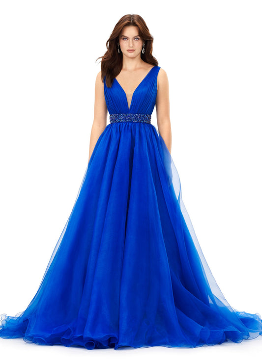 Ashley Lauren 11305 Stand out in this ball gown complete with a crystal encrusted waistband. The bustier has a deep v-neckline and a v-back. The gown is finished with a long, lavish train. V-Neckline V-Back Crystal Belt Organza COLORS: Orange, Royal, Red