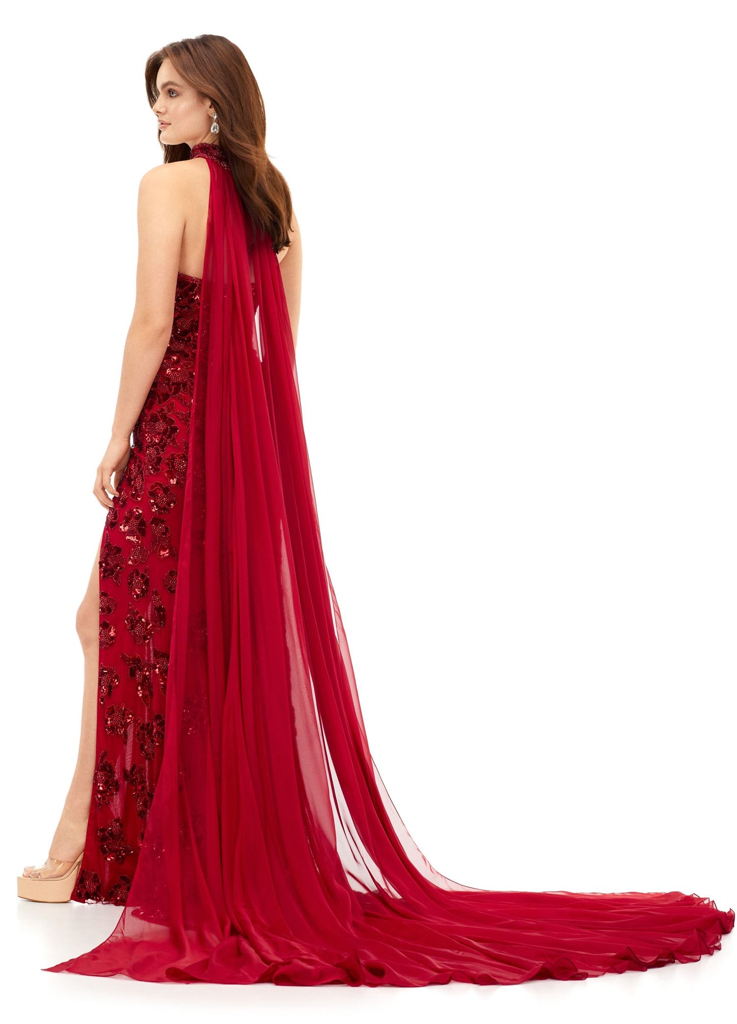 Ashley Lauren 11351 All we can say is WOW! This strapless beaded gown with crystal detailing is sure to make a statement at your next event. The gown features a gorgeous beaded neck choker with attached chiffon cape. Strapless Gown Beaded Choker Chiffon Cape Left Leg Slit COLORS: Royal, Ivory, Red, Neon Pink