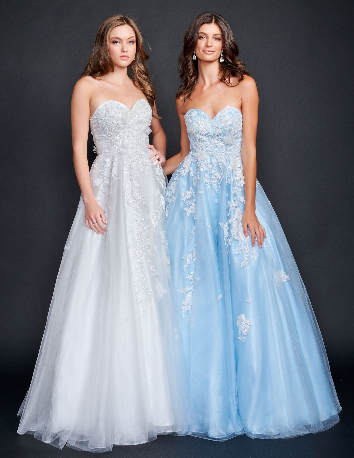 Nina Canacci 9137  This is a strapless ballgown with a sweetheart neckline and 3D floral appliques on the bodice and streaming down the dress. It is good for a Wedding dress or Prom Gown.   Available Size- 4-18  Available Color- Baby Blue, Ivory