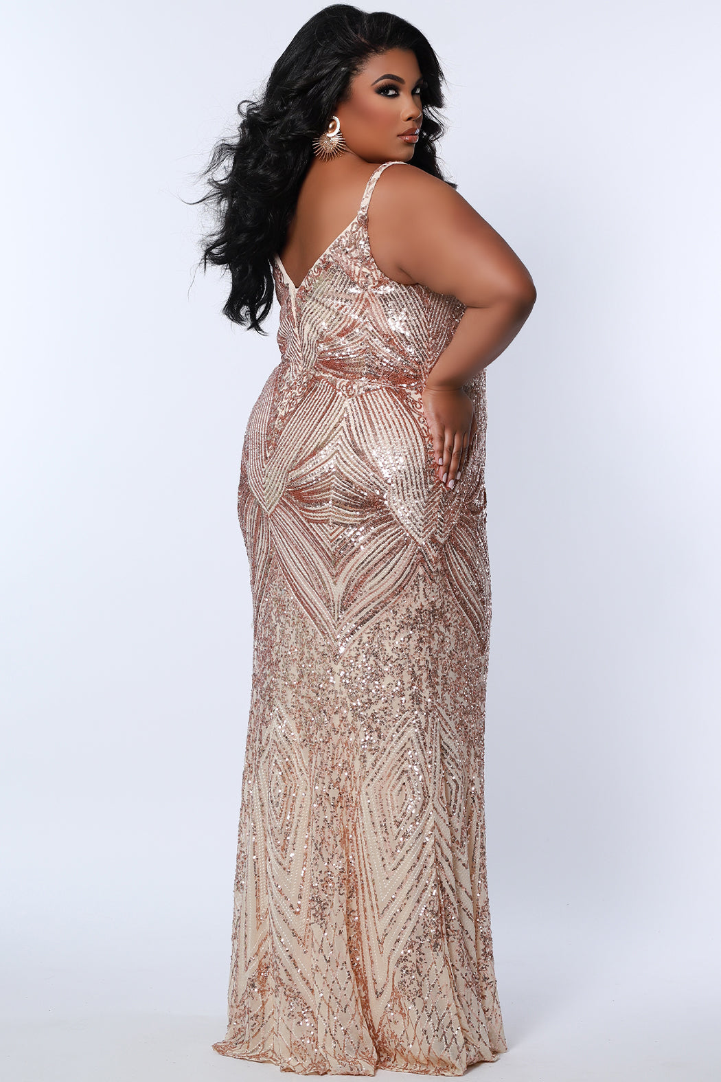 Sydney's Closet SC7340 Rose Gold Fitted Evening Gown Sequins V Neckline Plus Size Prom Dress. Look dazzling like a diva in Sydney's Closet SC7340 Rose Gold Fitted Evening Gown. Its sequined V-neckline, fitted silhouette, and plus size design will make you shine like a star at your prom! All eyes will be on you. Oooh la la!