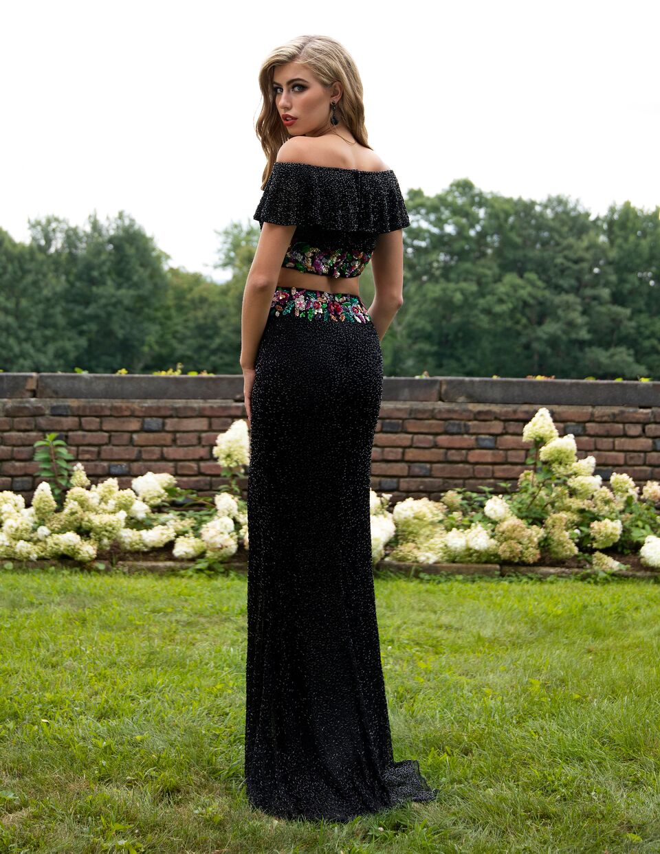 Primavera Couture 3215 Black Size 16 Prom Dress Pageant Gown  A two piece beautiful prom gown with off the shoulder boho beaded ruffle sleeves and a beaded floral design waistline with a side slit. 