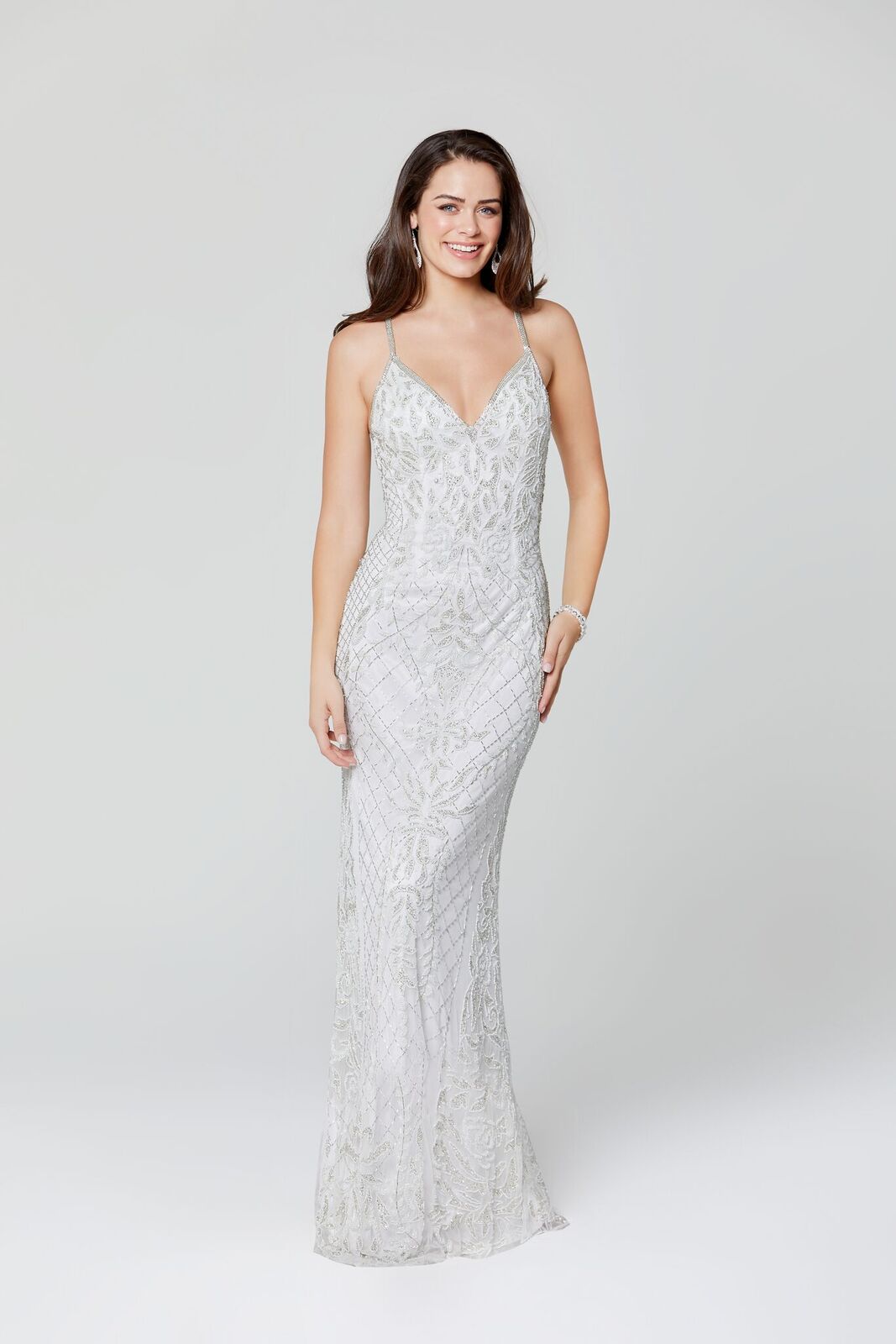 Primavera Couture 3428 is a beaded sequins Prom Dress, Pageant Gown, Wedding Dress & Formal Evening Wear gown. This Gown Features a v neckline with spaghetti straps that criss cross in the open back 