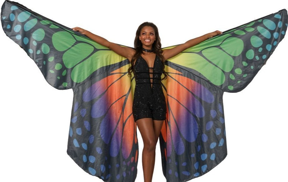 Johnathan Kayne 2100 is a Butterfly Wings Romper Crystal Embellished Lace Romper. Featuring a Plunging neckline with a mesh insert and sheer cutout side panels. Horizontal Waist accent belts. Featuring a Monarch Butterfly Halter Cape with extended reach. 